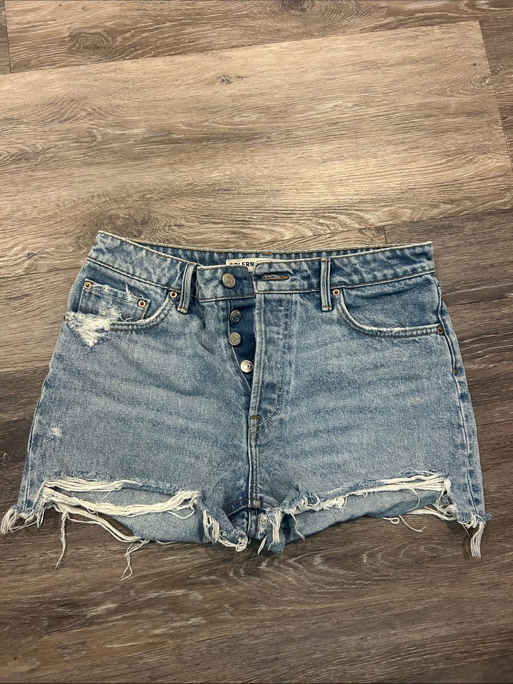 GRLFRND Distressed High-Rise Denim Shorts in Light Blue